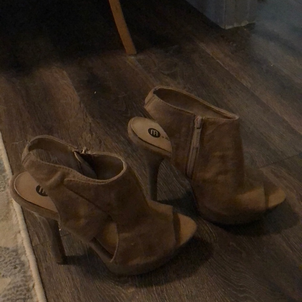 Tan heels 3 inch high partial wedge.